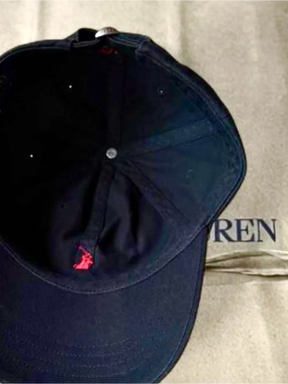 Polo Ralph Lauren black baseball hat with red logo, adjustable fit